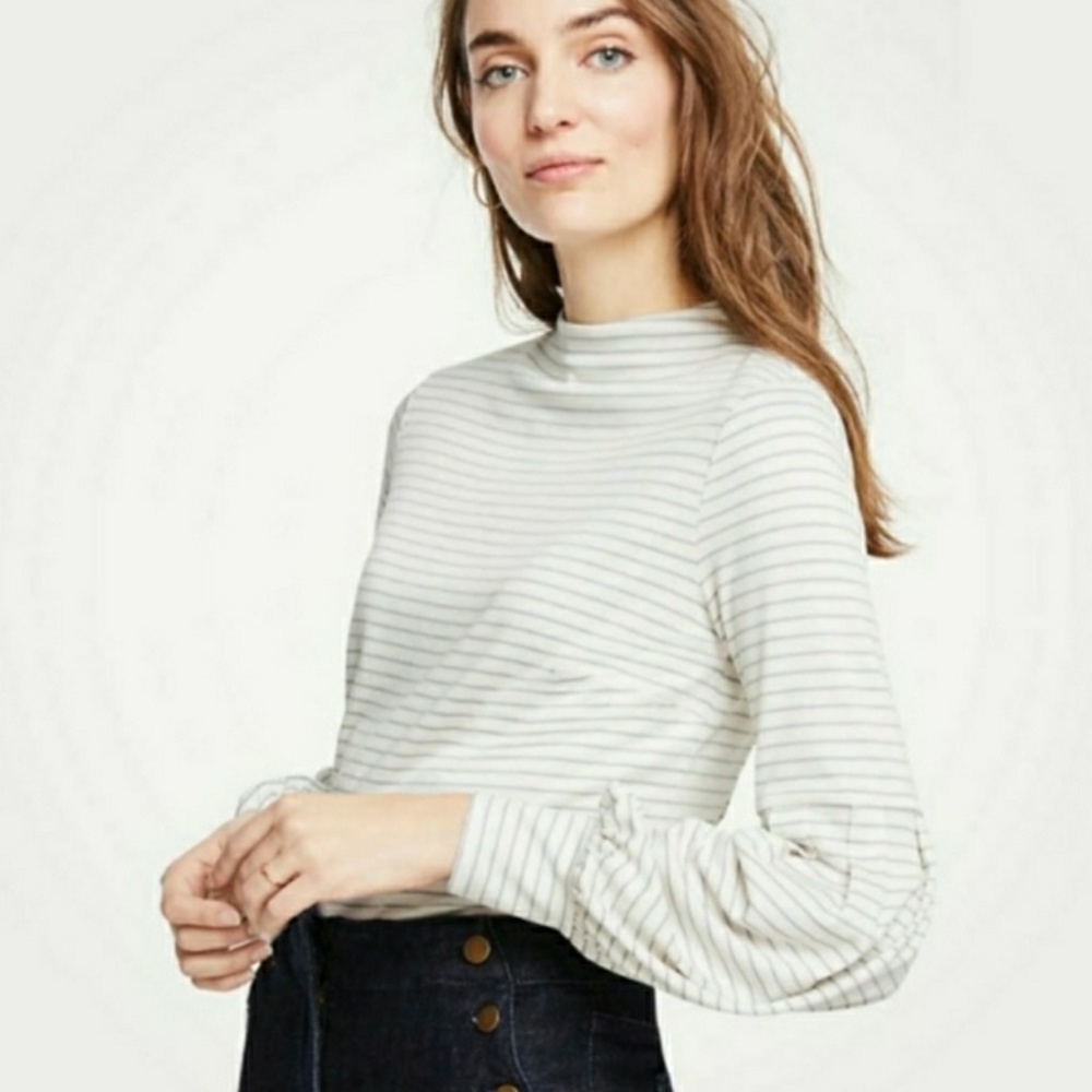Black and soft white striped mock neck top